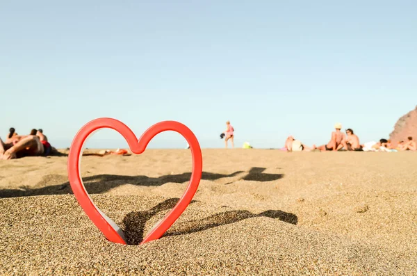 Srdce na písečné pláži — Stock fotografie