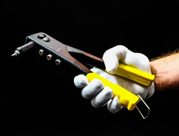 Rivets Pliers and a Hand — Stock Photo, Image