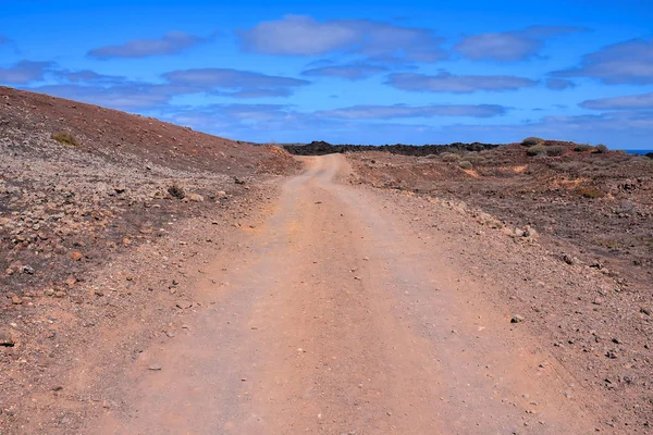 图为郊野沙漠泥泞道的图片 — 图库照片