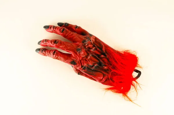 Närbild av carnival mask djävul handske — Stockfoto