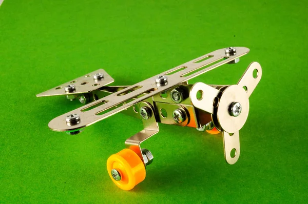 Piccolo aeroplano giocattolo in metallo — Foto Stock