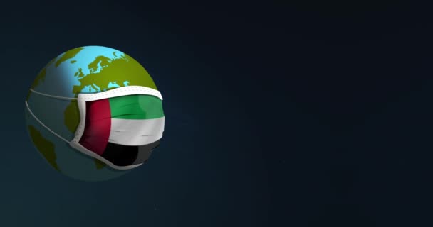 Animation of Earth globe in medical face mask with Flag of the United Arab Emirates on it for bacteria or virus protection. Concept of dangerous pandemic coronavirus. Isolated on black background. — Stock Video