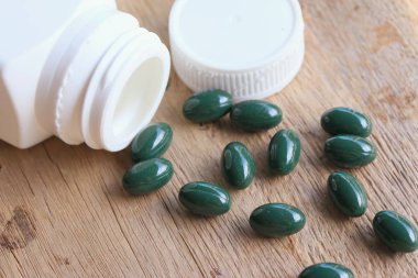 ahşap üzerine Vitamin hapı