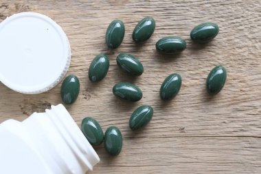 ahşap üzerine Vitamin hapı