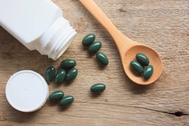 ahşap üzerine Vitamin hapı