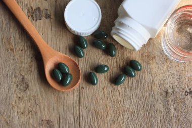 ahşap üzerine Vitamin hapı