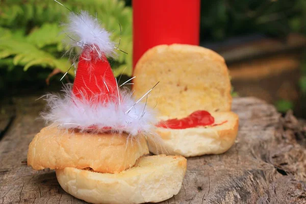 Bread and santa hat — Stock Photo, Image