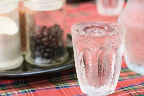 Drinking water at coffee shop — Stock Photo, Image