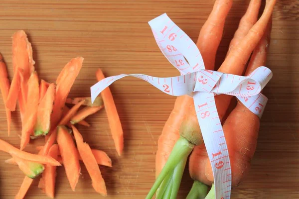 Fresh carrot on wood — Stock Photo, Image