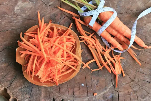 Fresh carrot on wood — Stock Photo, Image