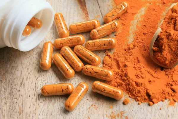 Turmeric capsule with powder