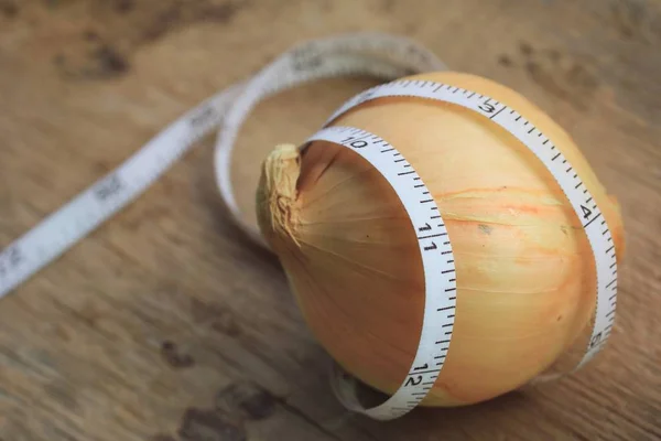 Fresh onion on wooden — Stock Photo, Image