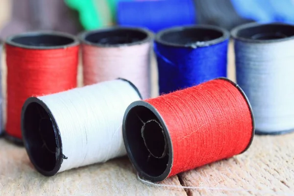 Thread spool and zipper — Stock Photo, Image