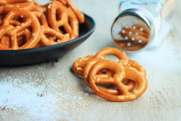 Salted pretzels on wood — Stock Photo, Image