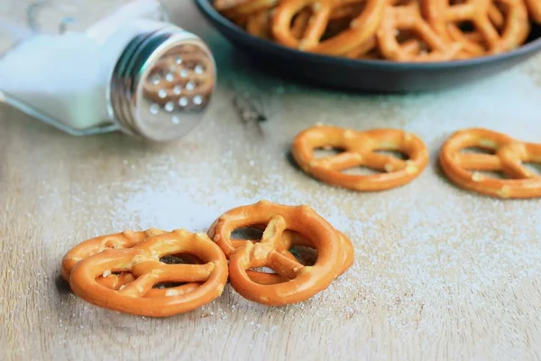 Salted pretzels on wood — Stock Photo, Image