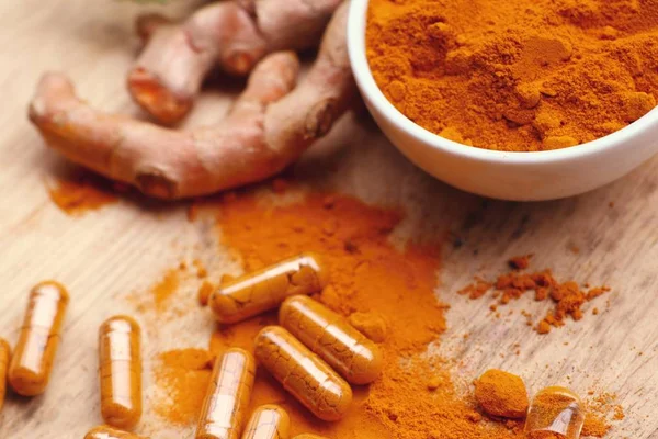 Turmeric capsule with powder