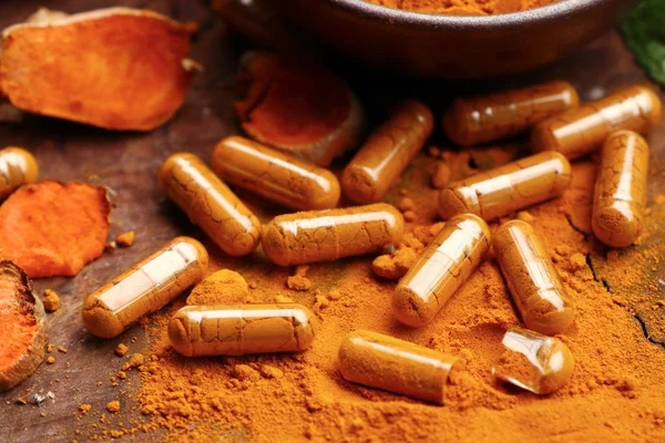 Turmeric capsule with powder