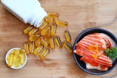 Balık yağı kapsülleri ile taze