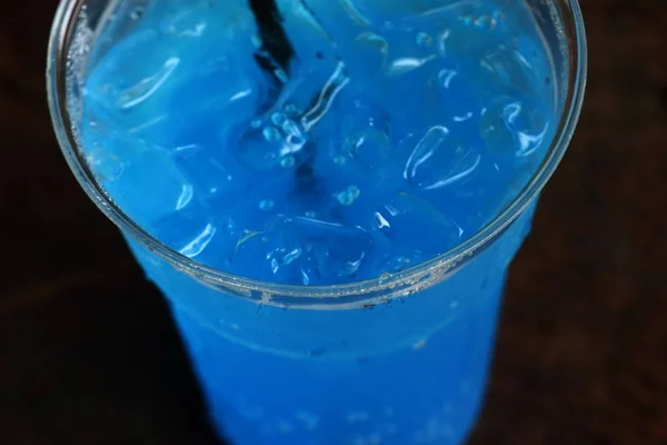 Blue soda drinking water — Stock Photo, Image