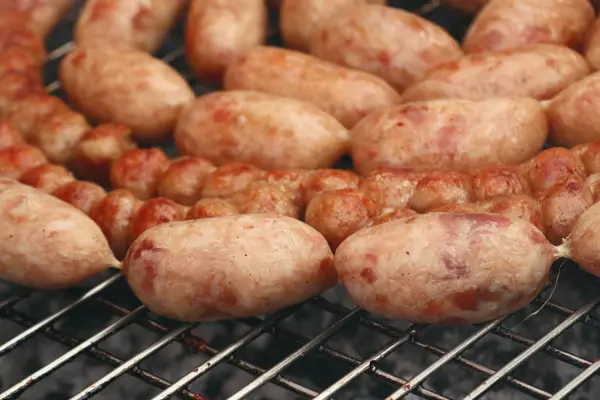 Grilled sausages at the market — Stock Photo, Image
