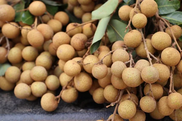 Longan fruits dans la rue — Photo