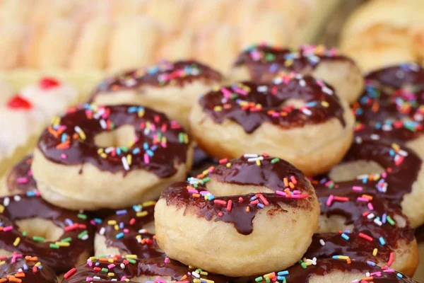 Sweet donuts at street food — Stock Photo, Image