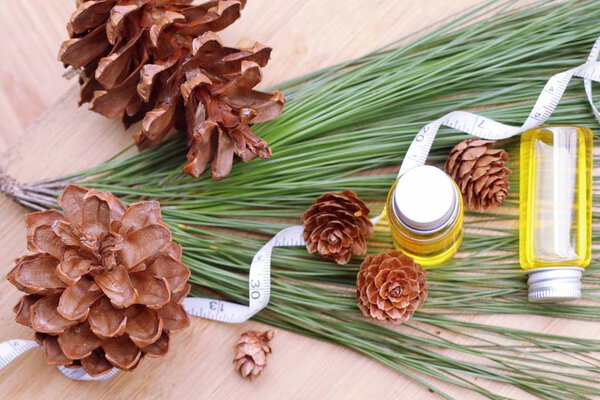 essential pine oil and cone