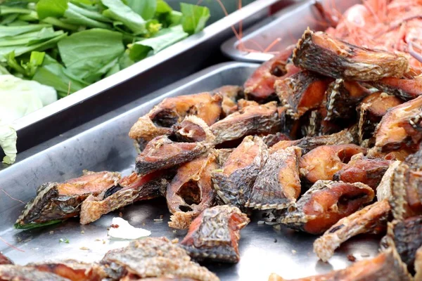 Fried fish at street food — Stock Photo, Image