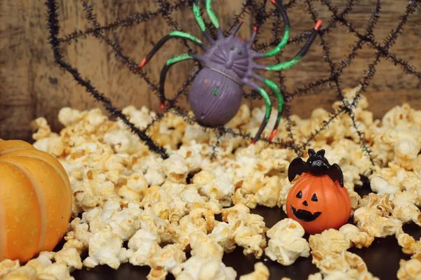 Halloween popcorn  with artificial spider — Stock Photo, Image