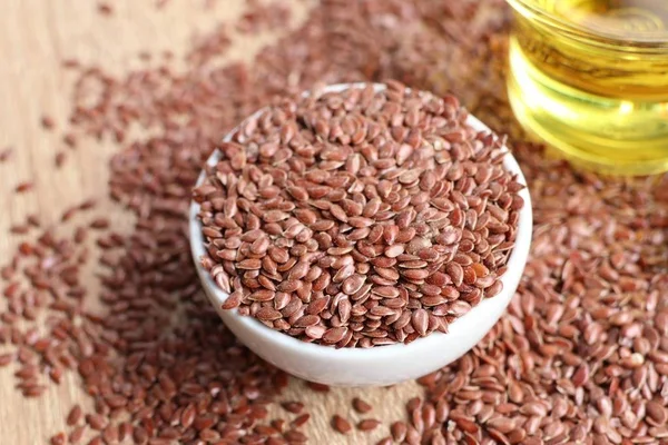 Flax seed with oil — Stock Photo, Image