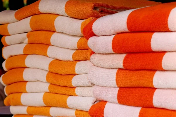 Stack towels by the pool — Stock Photo, Image