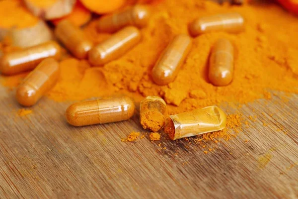 Turmeric capsule with powder