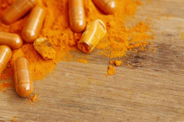 Turmeric capsule with powder