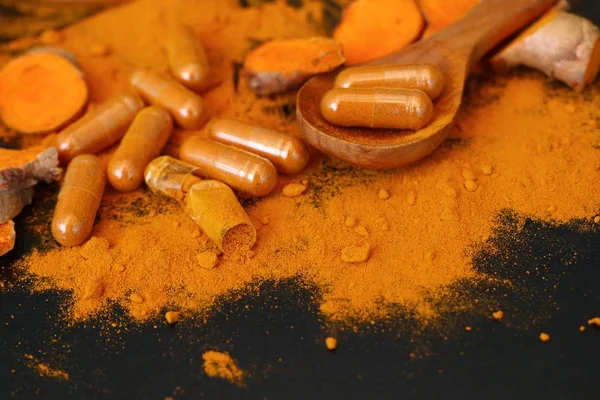 Turmeric capsule with powder