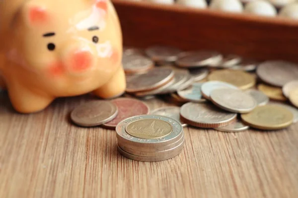 Piggy bank with thai coins — Stock Photo, Image