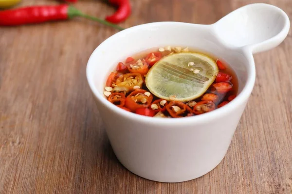 Chili fish sauce with lemon — Stock Photo, Image