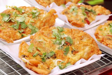 Yumurta ile çıtır çıtır kızarmış midye