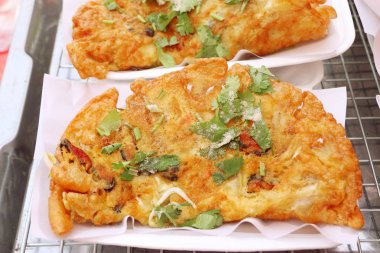 Yumurta ile çıtır çıtır kızarmış midye