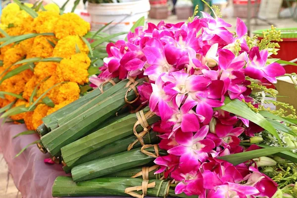 Purple orchid flowers at market — Stock Photo, Image