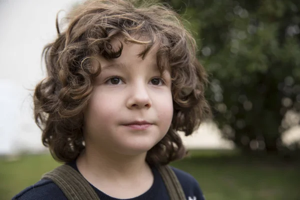 Little Boy Curly Hair Tooth Posing Green Bib — 스톡 사진