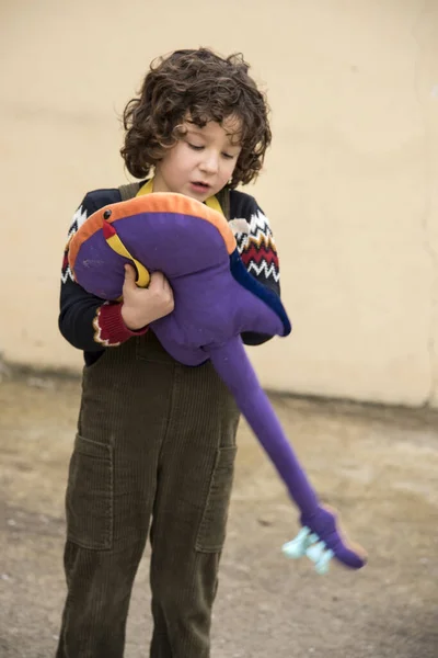 Boy Playing Experimenting Toy Guitar Striking Colors — 스톡 사진