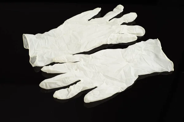 Beige Latex Gloves Black Background Protector Prevent Contagion — Stock Photo, Image