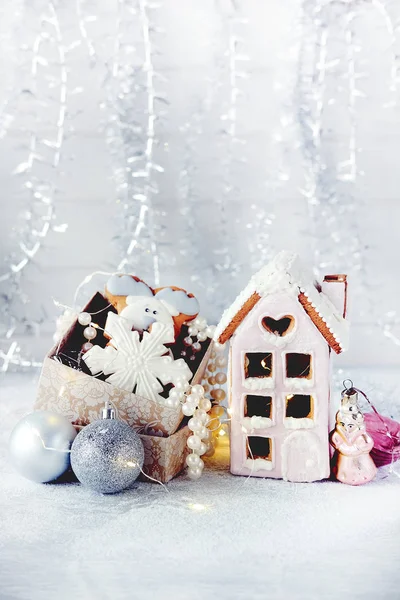 Magical winter christmas picture. Gingerbread house with snow.