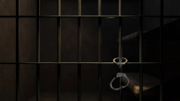 Schwach beleuchtete Gefängniszelle und Handschellen — Stockfoto