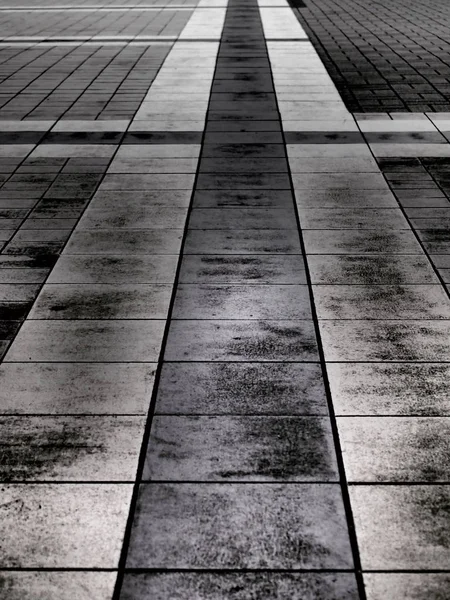 Abstrakcyjne Monochromatyczne Zdjęcie Brukowanego Chodnika — Zdjęcie stockowe
