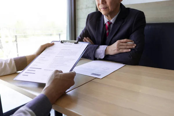 Job seeker talking and presentation about himself with interview employee for job interview in the office, Job applications concepts.