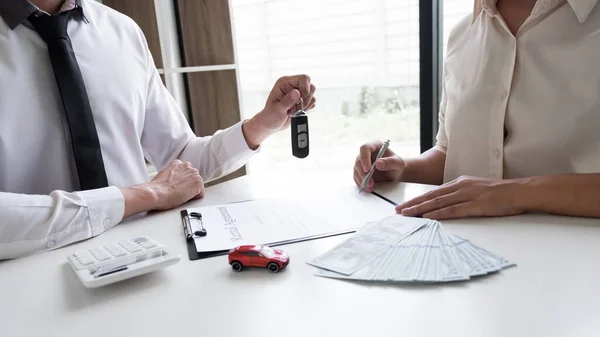 Car Sales Representative Gives The Key To Customer After Signed The Sale Contract In The Office Car Rental Concept Stock Images Page Everypixel