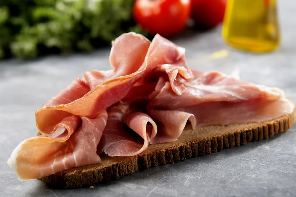 Italian bruschetta with parma ham — Stock Photo, Image