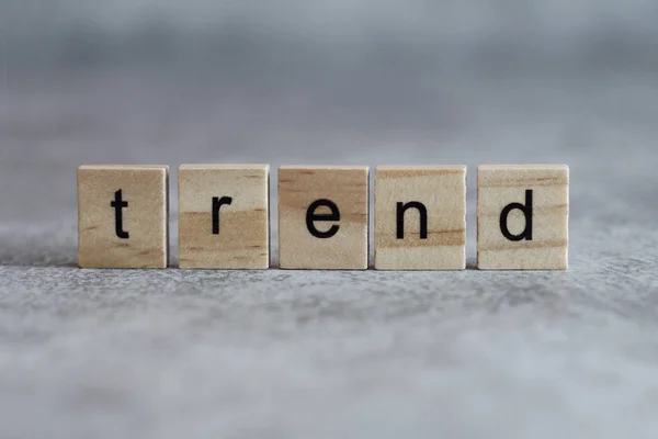 Trend word written on wood cube — Stock Photo, Image