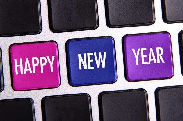 Feliz año nuevo en el teclado . — Foto de Stock
